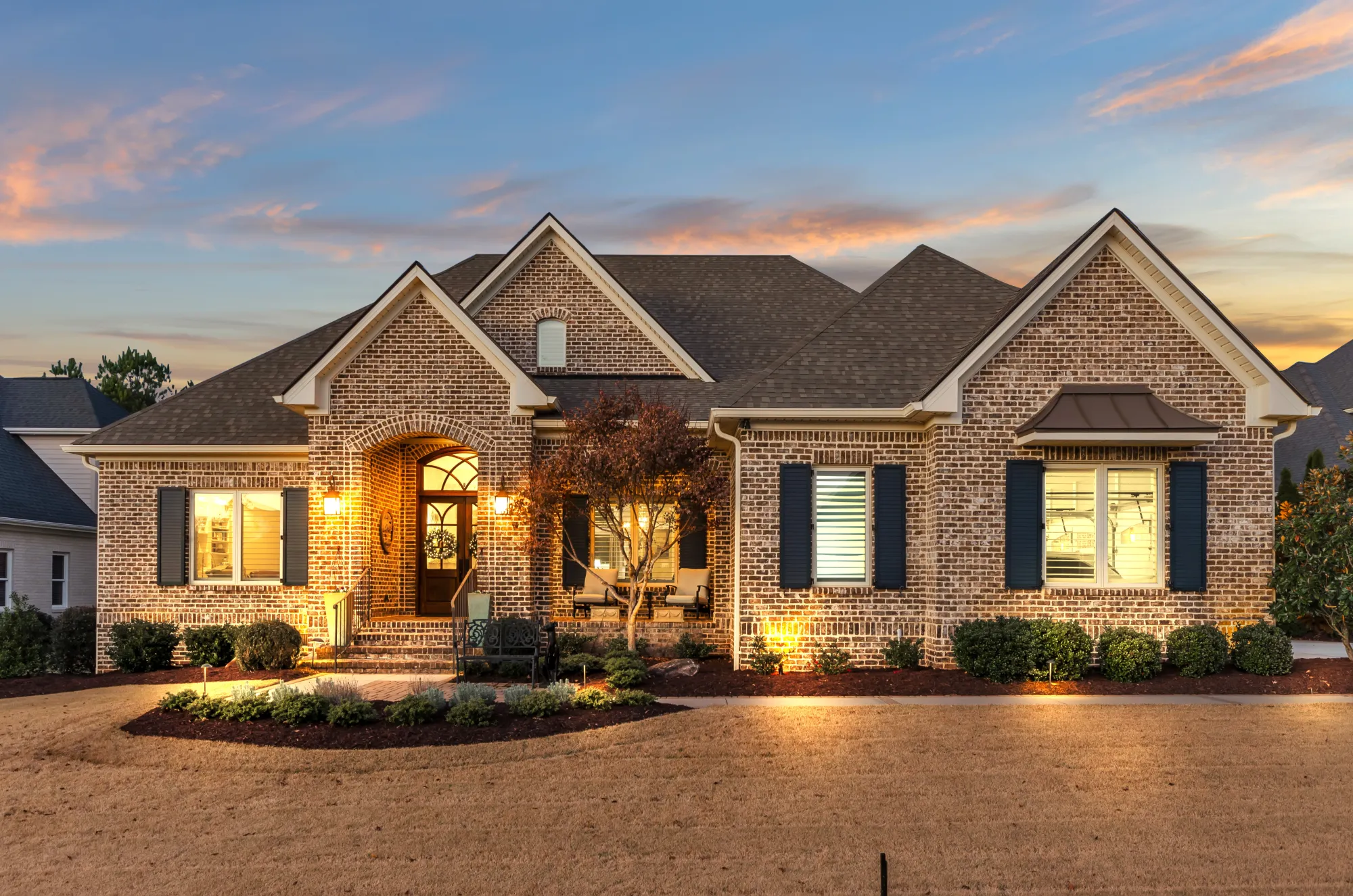Brick estate at dusk